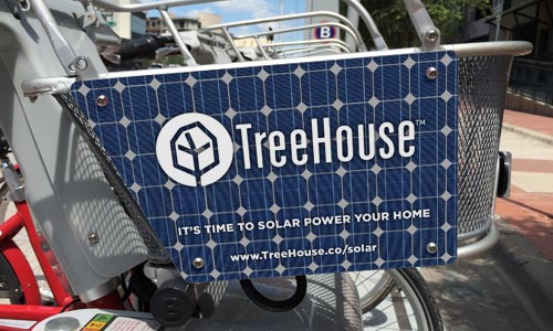 Bike basket advertisemtn with solar panel image on it