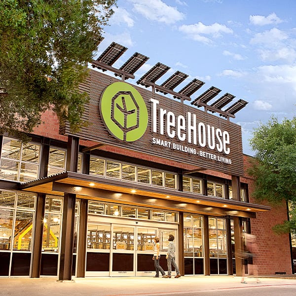 Two story high home improvement store front for a company called Treehouse.